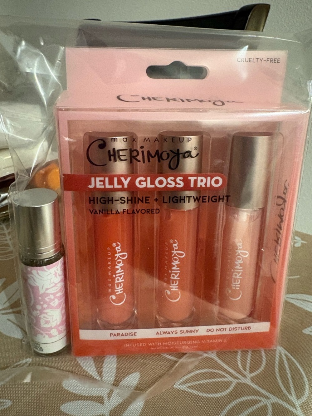 Jelly Gloss Trio High-Shine Lip Gloss Set and alcohol free roll on oil